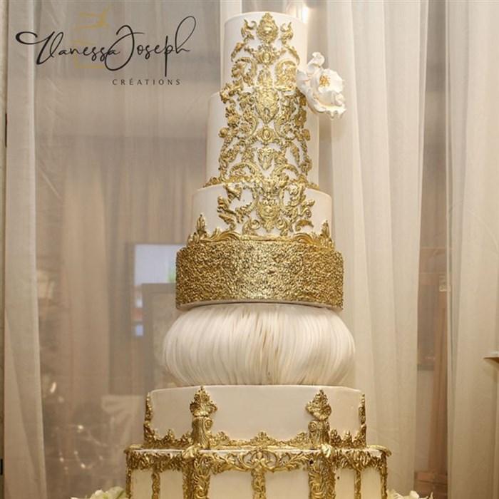Royal white and gold wedding cake